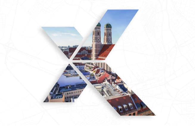 Stadtansicht mit Kirchtürmen und Dachlandschaft als Symbol für digitale Bauleitplanung und XPlanung in Bayern